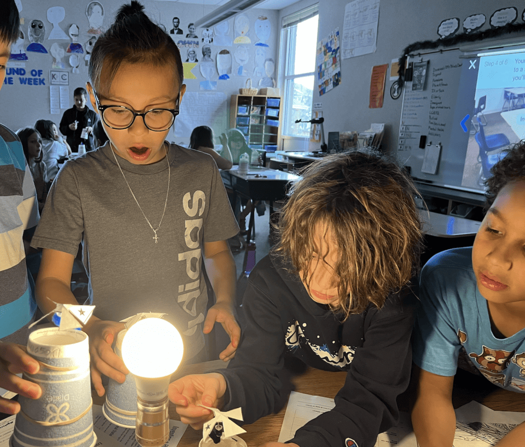 Students in Mr. Radtke's fourth grade class have fun with a science experiment.