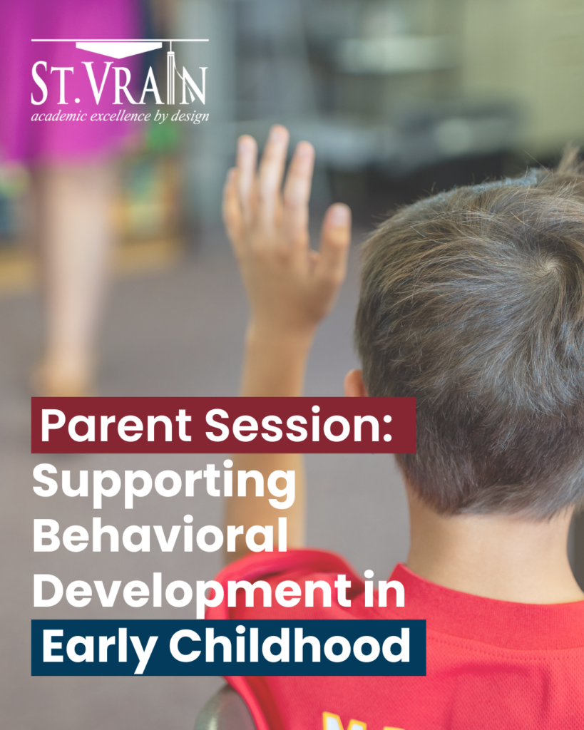 A child raises their hand in a classroom during a parent session on supporting early childhood behavioral development.